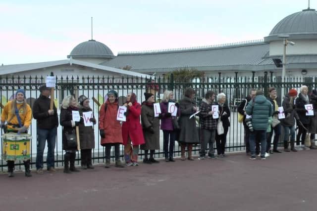 Hundreds queued up outside Hastings Pier to show their love for the landmark