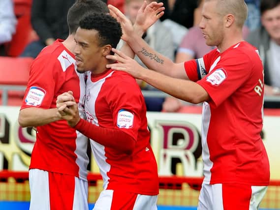 Nicky Ajose celebrates scoring the winner for Crawley Town against Leyton Orient in 2012. Picture by Jon Rigby
