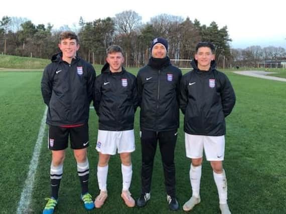 From left to right goalkeeper Taylor Seymour, Chichester College's Liam Brady, England Colleges manager Darin Killpartrick and Worthing's Ricky Aguiar