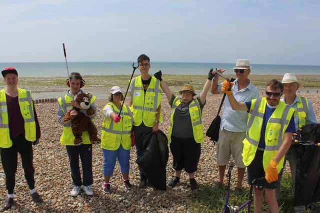 Members of Oak Community Group at their weekly beach clean