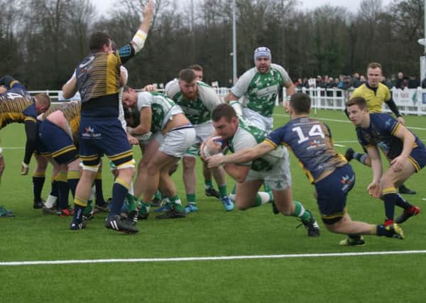 Michael Tredgett on his way for the opening try for Horsham RUFC. Photo by Clive Turner