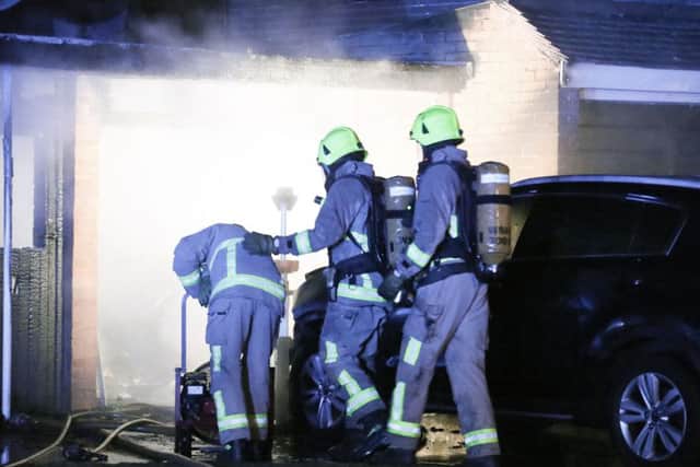Crews tackle a garage fire in Silverdale Drive in Sompting