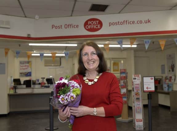 Janice Hall on her last day at Langney Post Office after working there for 27 years (Photo by Jon Rigby)