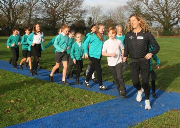 DM1911492a.jpg. Sally Gunnell opens new running track at Henfield Primary School. Photo by Derek Martin Photography. SUS-190114-122852008