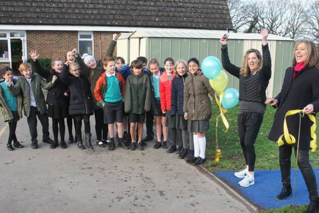 DM1911441a.jpg. Sally Gunnell opens new running track at Henfield Primary School. Accompanied by headteacher Denise Maurice. Photo by Derek Martin Photography. SUS-190114-122808008