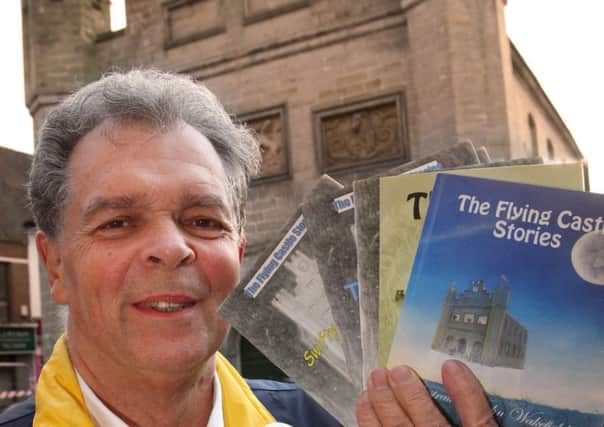 Robert Mayfield with his published book outside the old Town Hall -photo by steve cobb ENGSNL00120110111115250