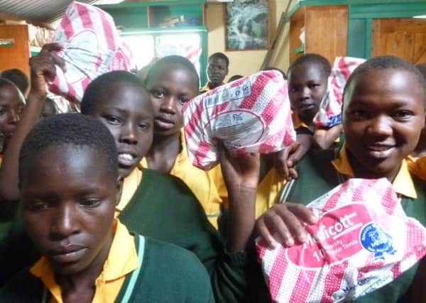 Girls at Mbara were delighted to recieve sanitary towels SUS-190116-100828001