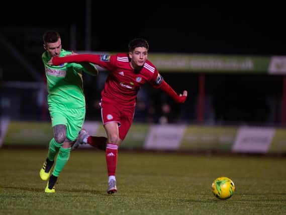 Ricky Aguiar comes away with the ball against Dorking Wanderers. Picture: Marcus Hoare