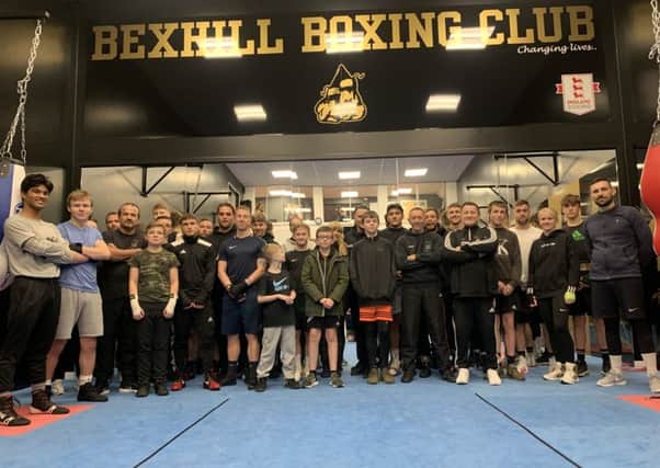 Bexhill Boxing Club boxers and coaches at the club's completely refurbished gym