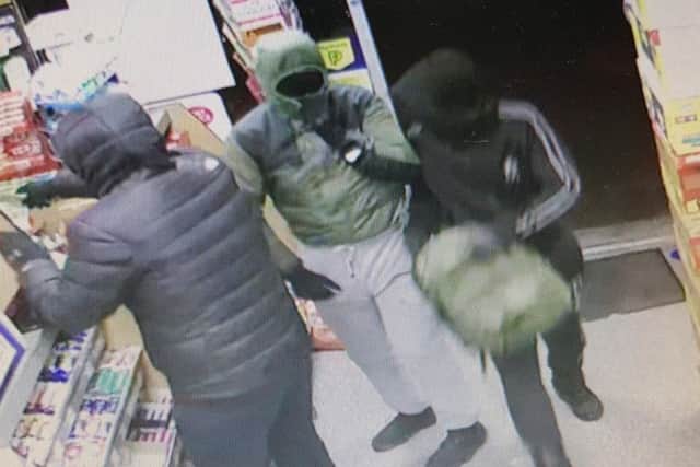 Knife-wielding masked men steal cash and cigarettes from Brighton post ...