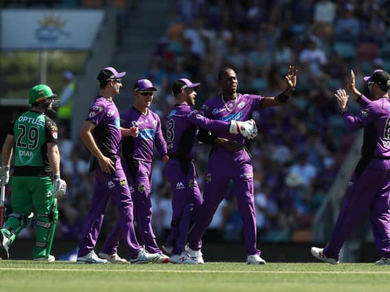 Jofra Archer celebrates taking the wicket of Travis Dean during Hobart Hurricanes v Melbourne Stars Big Bash League Match (Photo by Mark Metcalfe/Getty Images)