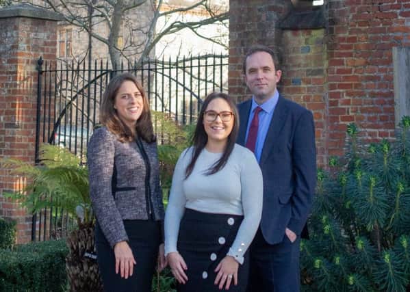 Edward Cooke Family Law. Solicitor Michelle Lewis, office manager Daisy Hofgartner and director Edward Cooke