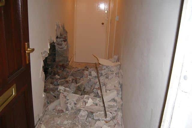 This was the scene after a car crashed into the hallway of the house in Tideswell Road in 2009