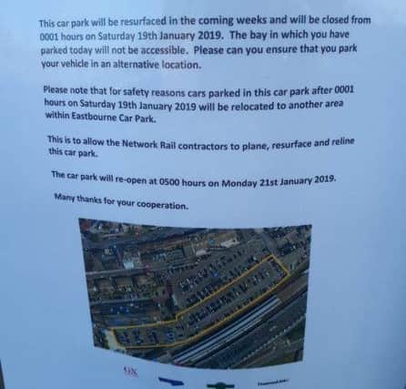 A notice displayed on railings outside Eastbourne station