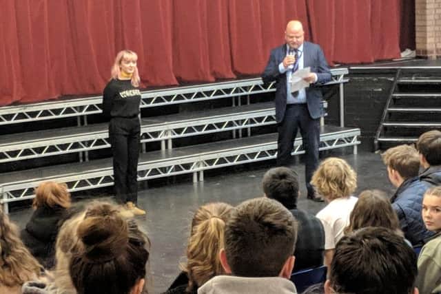 Steyning Grammar School headteacher Nick Wergan introducing Maisie Williams before her talk
