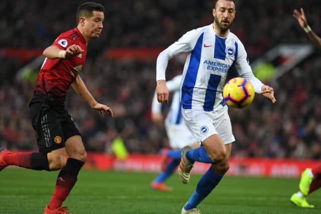Glenn Murray and Ander Herrera looking to contest the ball. Picture by PW Sporting Photography.