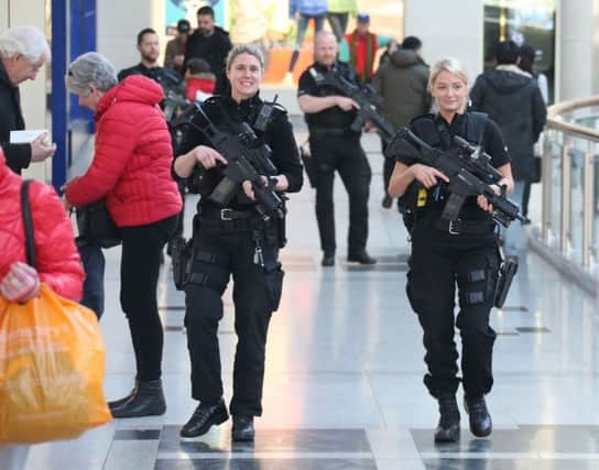 Armed police in Churchill Square, Brighton, today