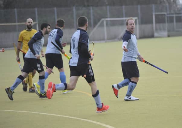 South Saxons celebrate one of their goals in the 4-3 win at home to Marden Russets. Pictures by Simon Newstead