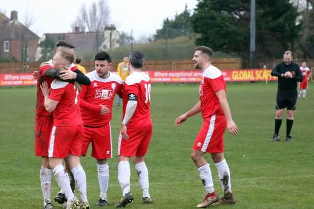 Pirates celebrate their winner / Picture by Roger Smith