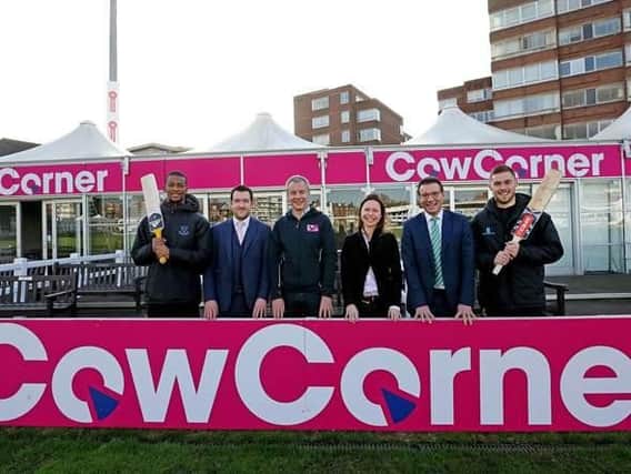 Sussex batsmen Delray Rawlins (far left) and Phil Salt (far right), join (l-r) Chris Coleman (Sussex Cricket head of community cricket), Matthew Rourke (Cow Corner founder and chairman), Nicola Craddock (Cow Corner investment director) and Rob Andrew (Sussex Cricket chief executive) at Cow Corner / Photo: Sussex Cricket