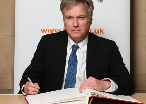 Henry Smith MP signs the Holocaust Educational Trusts Book of Commitment