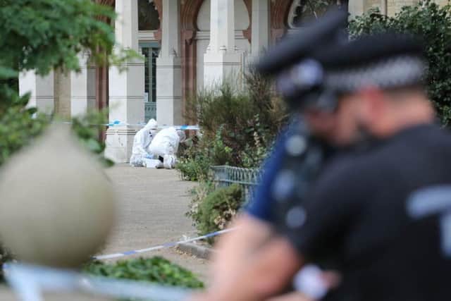 Police at the scene of the attack in Brighton