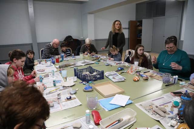 Mary Stanford memorial pebble painting workshop. Photo by KT Bruce. SUS-190121-153047001
