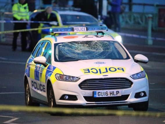The police car involved in the incident on Brighton seafront