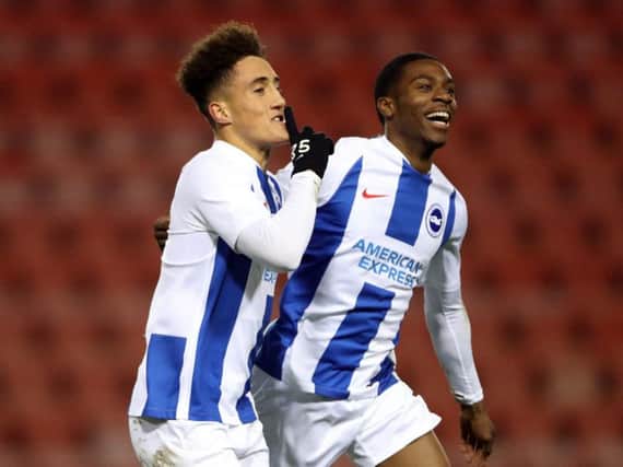 Haydon Roberts (left) celebrates scoring in Brighton's FA Youth Cup win at Manchester United. Picture by BHAFC/Paul Hazlewood
