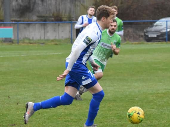 Callum Saunders scored the only goal, a penalty, in Haywards Heath Town's 2-1 home defeat against Guernsey on Saturday. All pictures by Grahame Lehkyj.