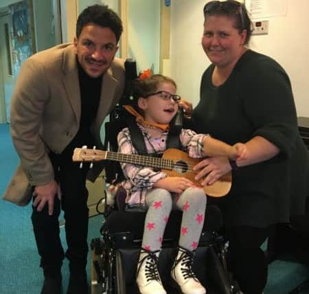 Peter Andre meeting Izzy at Chestnut Tree House SUS-190122-173949001