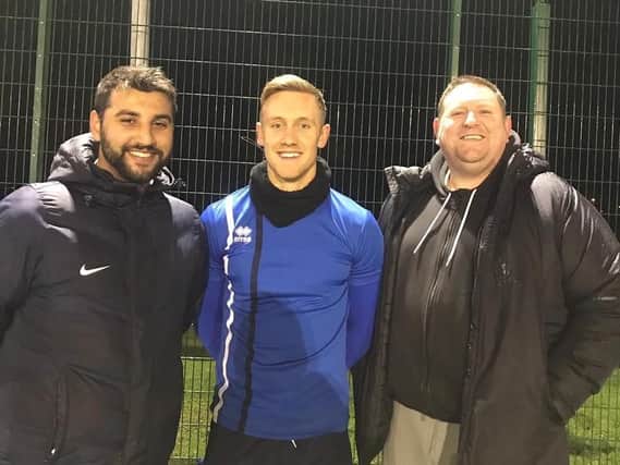 New Shoreham signing Jack Rowe-Hurst (centre) and Mussels manager Curtis Foster (left)
