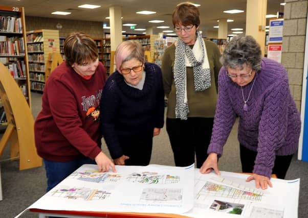 Library users poring over the plans. Picture: Steve Robards SR1901554