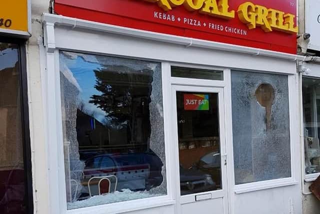 One of the smashed windows. Photo: Adur and Worthing Police/Facebook