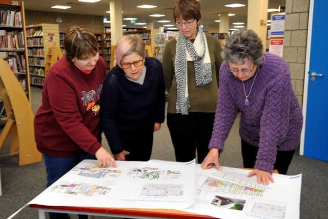 Library users poring over the plans. Picture: Steve Robards SR1901554