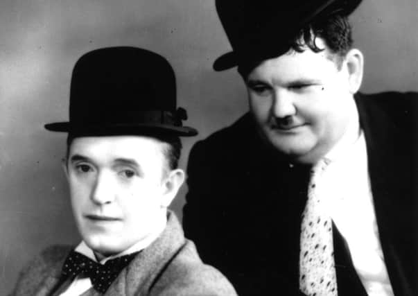 Stan Laurel and Oliver Hardy 146426926,3461739,51793011,52236