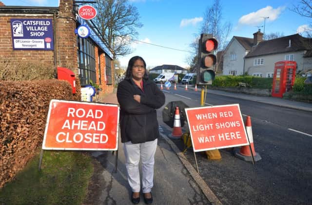 Priya Kumanan from Catsfield Village Shop is annoyed at the ongoing roadworks outside her shop. SUS-190128-134641001