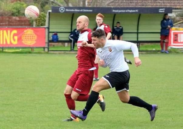 Little Common player-manager Russell Eldridge in action against Pagham two weeks ago. Picture courtesy Roger Smith