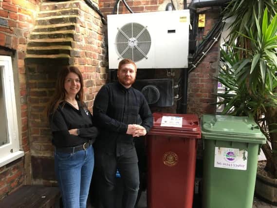 Shift manager Helen Darcy with pub manager Brad Joyce where the bins are kept