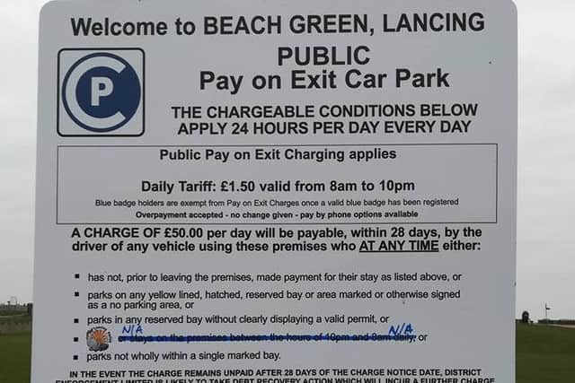 The amended sign at Beach Green car park. Photo by Geoff Patmore