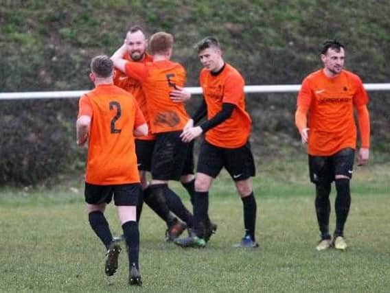 Mile Oak celebrate a goal in the crushing win over Worthing United. Picture: Derek Martin