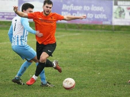 Action from Mile Oak's clash against Worthing United. Picture: Derek Martin
