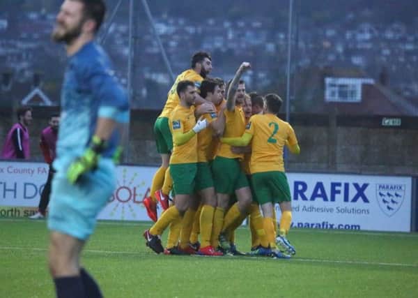 Horsham v Ramsgate. Rob O'Toole is mobbed after having fired Horsham ahead. Picture by John Lines