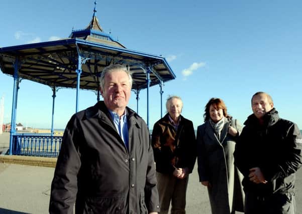 ks190041-2 Bognor Bandstand Funding phot kate Arun District Council has secured funding to improve the bandstand. celebrating the news from left: Phil Hitchins, chairman of Bognor Regis regeneration sub-committee, Jim Brooks, Arun councillor, Denise Vine group head of economy and Steve Reynolds, Mayor of Bognor.ks190041-2
