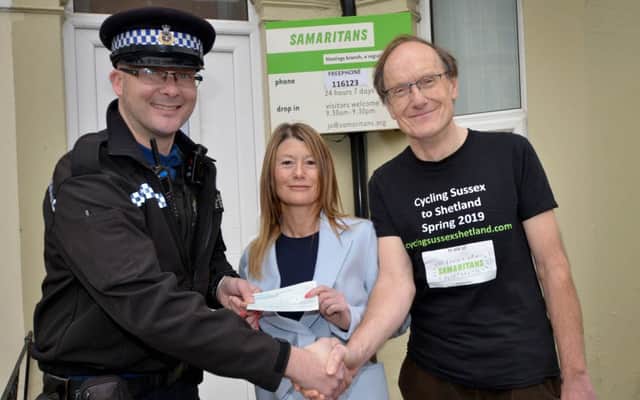 Sussex Police present money to the Samaritans in Hastings.

PCSO Daryl Holter is pictured handing over the cheque to Evie (Branch Director) and Steve (Treasurer). SUS-190129-130253001