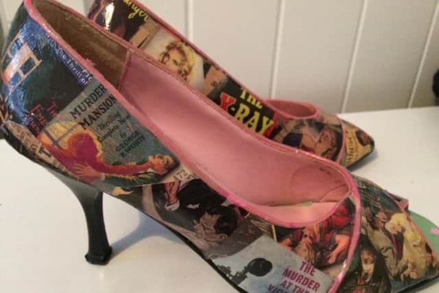 A pair of shoes that Shery Hall up-cycled with wrapping paper bought from Calneva, St Leonards on Sea SUS-190129-142021001