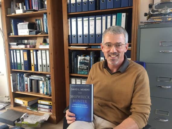 David Mearns with his new book 'The Shipwreck Hunter' SUS-170921-125334001