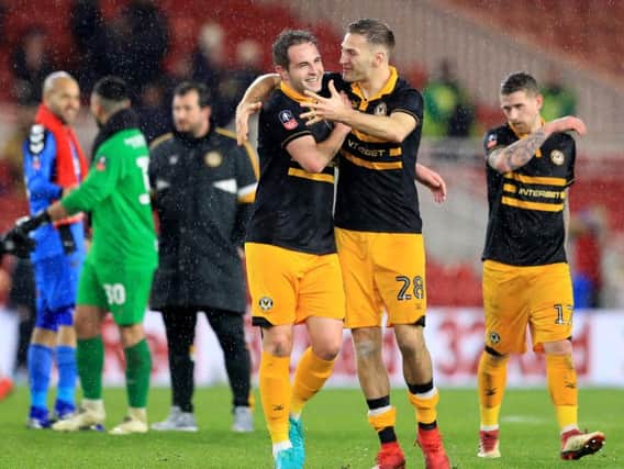 Mickey Demetriou (right) celebrates as Newport County secured an FA Cup replay with Championship side Middlesbrough.