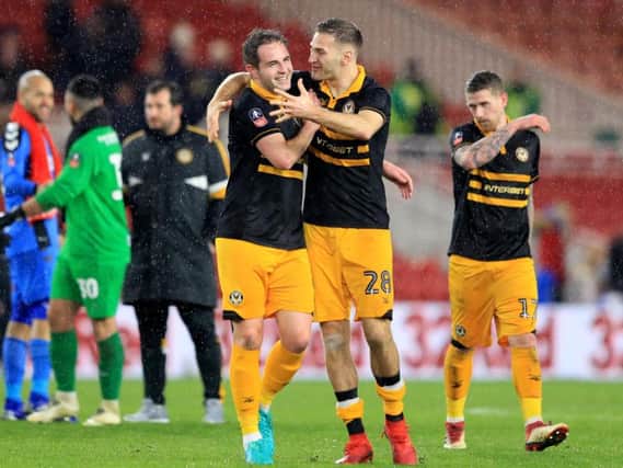 Mickey Demetriou (right) celebrates after Newport County forced a replay with Middlesbrough