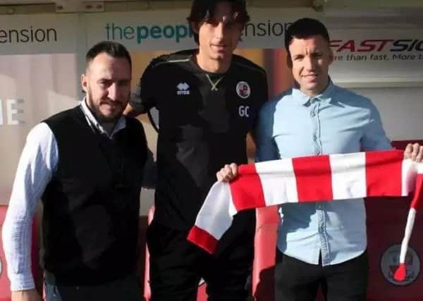 Crawley Town director of football Selim Gaygusuz, head coach Gabriele Cioffi and Jimmy Smith. Picture courtesy of Crawley Town SUS-181021-221611002